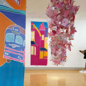 Suspended works and artwear by Judy Bales, Silk banners by Rene Shoemaker